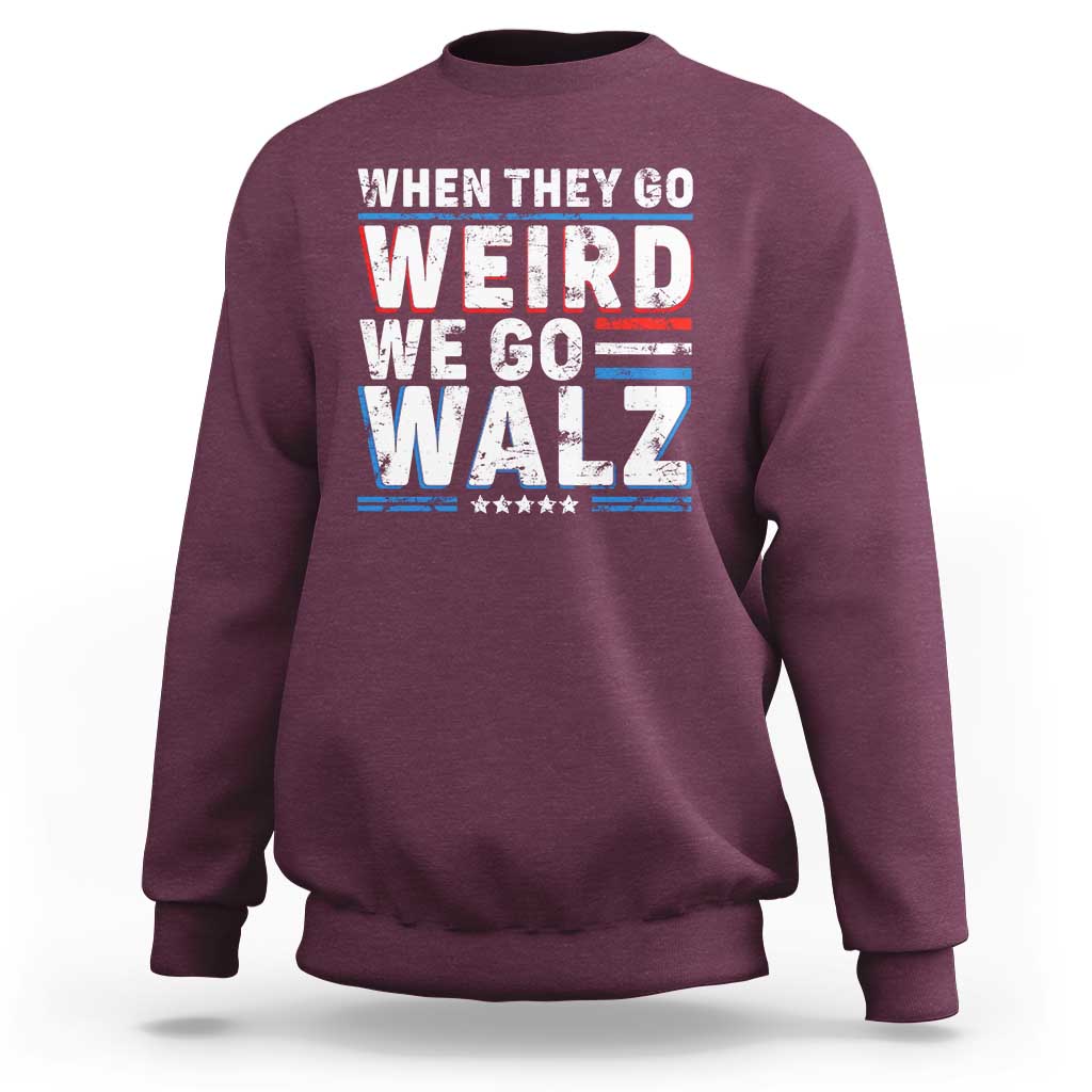 Maroon crewneck sweatshirt with bold 'WHEN THEY GO WEIRD WE GO WALZ' graphic