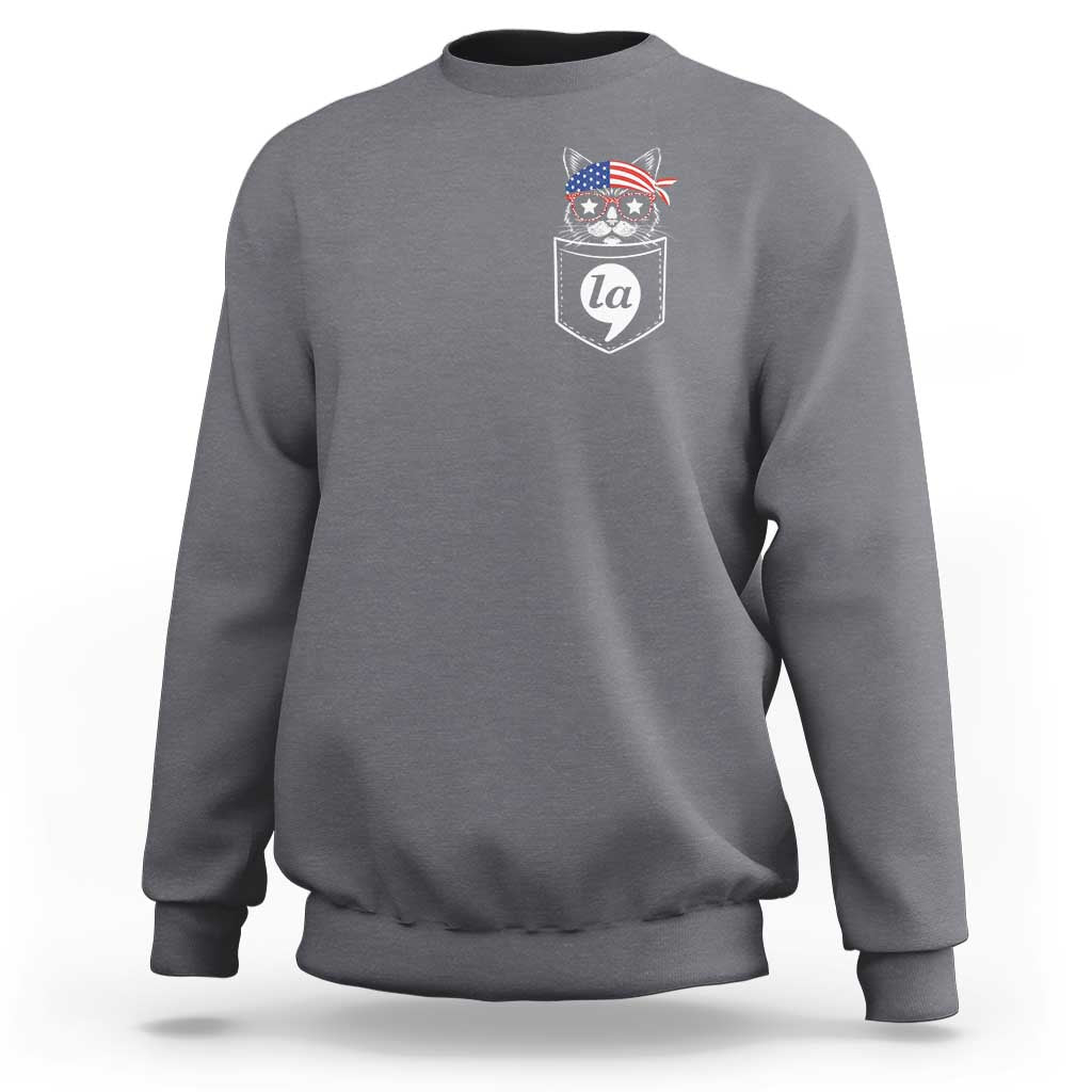 Gray crewneck sweatshirt with chest graphic of a cat wearing patriotic hat badge