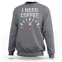 Charcoal gray crewneck sweatshirt with 'I NEED COFFEE' coffee meter graphic, long sleeves