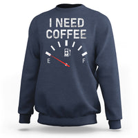 Navy crewneck sweatshirt with 'I NEED COFFEE' coffee meter graphic, long sleeves