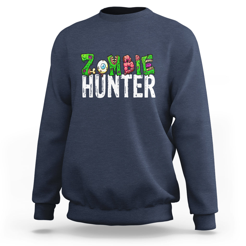 Navy Halloween sweatshirt with colorful zombie-eyed hunter graphic across chest