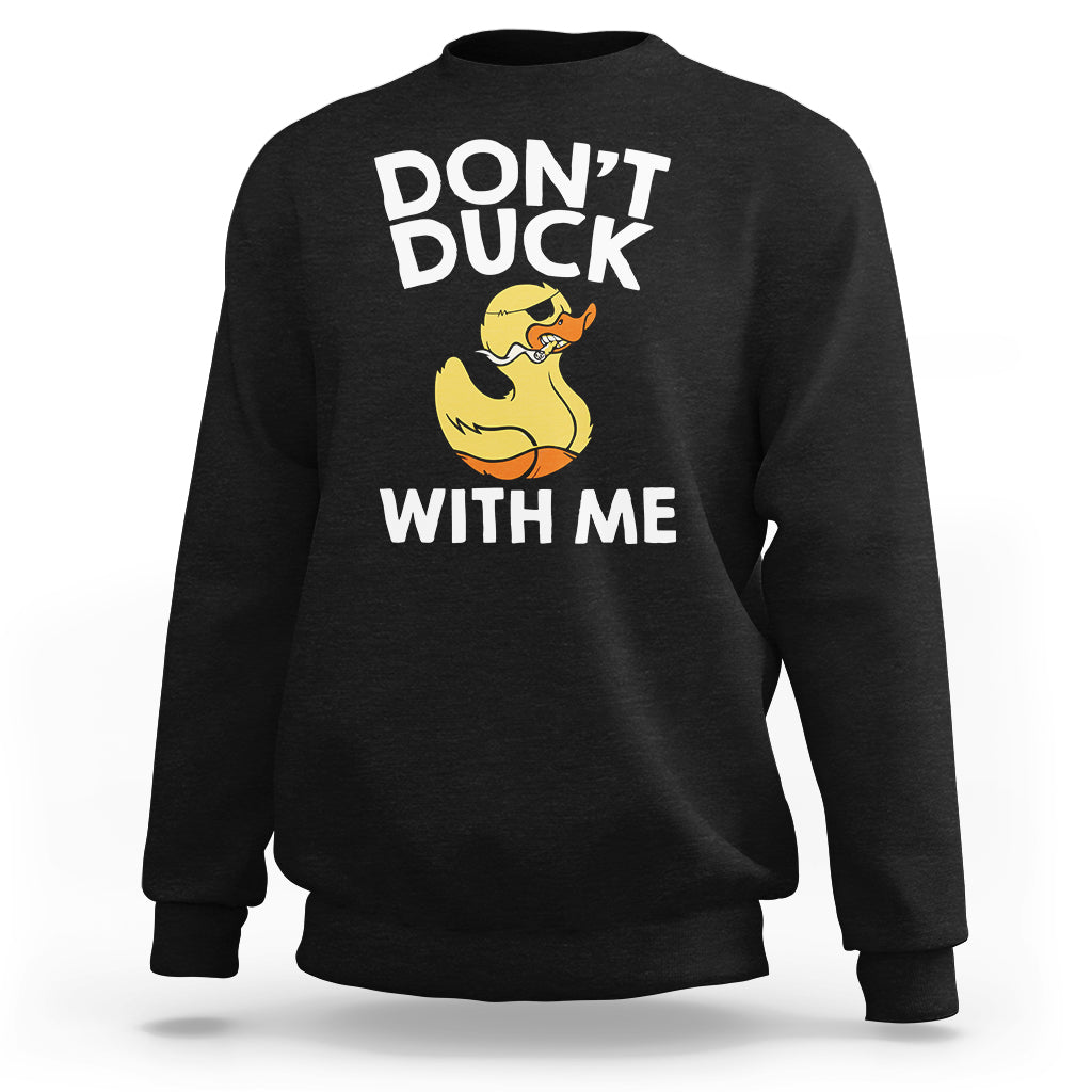 Black sweatshirt with front text “DON’T DUCK” and “WITH ME” plus yellow rubber duck graphic
