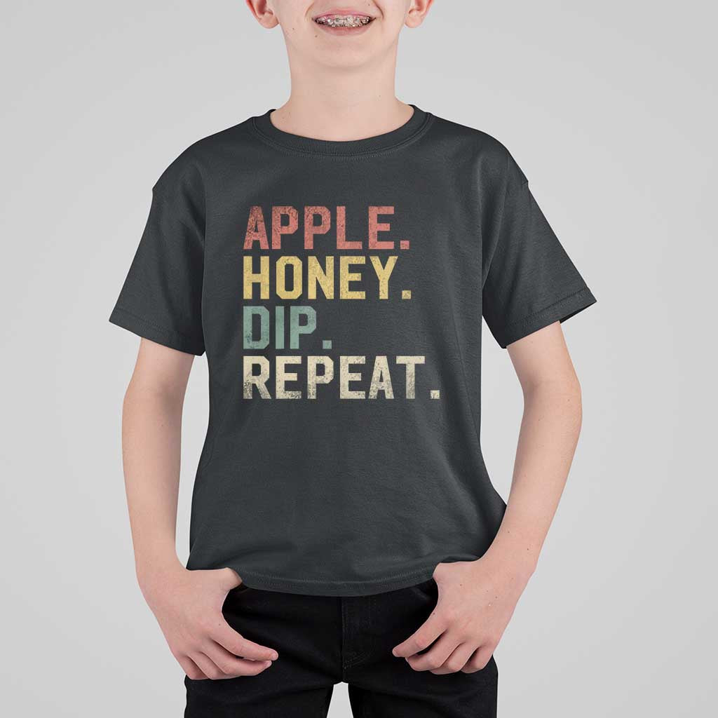 Kids T-shirt with 'APPLE. HONEY. DIP. REPEAT.' print, black.