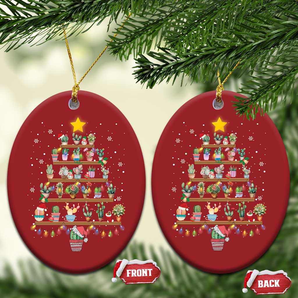 Two red oval Christmas ornaments with stacked gift display artwork and hanging loops