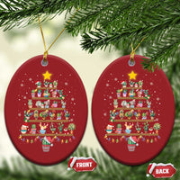 Two red oval Christmas ornaments with stacked gift display artwork and hanging loops