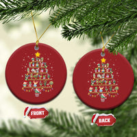 Two red round Christmas ornaments with stacked gift display artwork and hanging loops