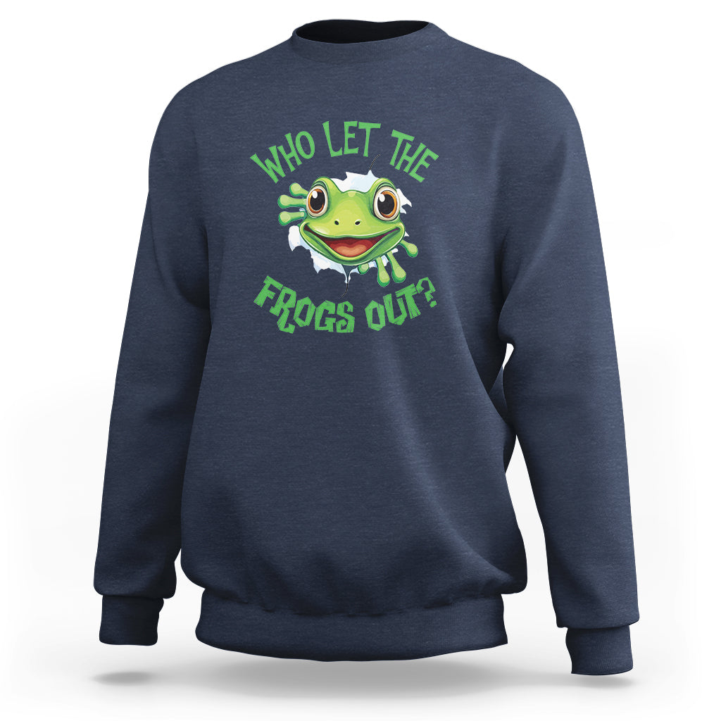 Navy sweatshirt with green frog graphic and text “Who Let The Frogs Out?”