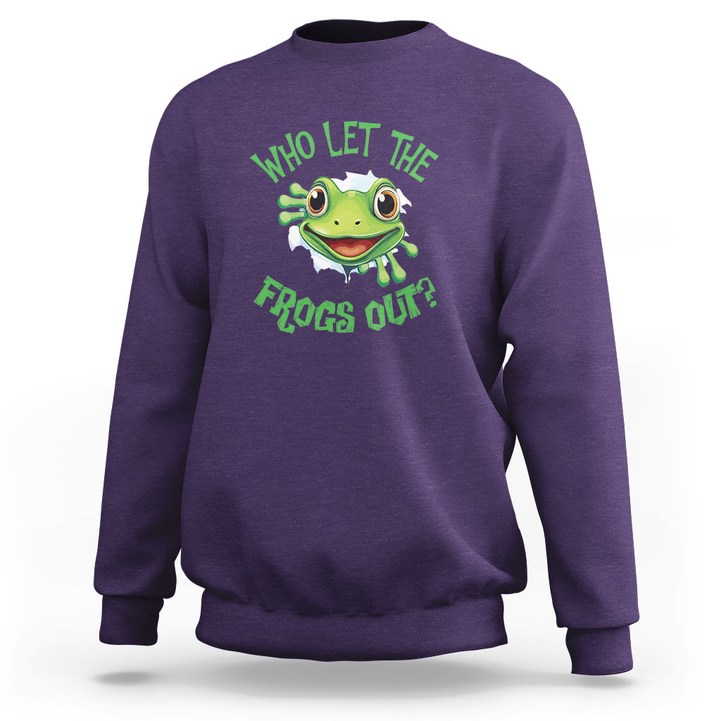 Purple sweatshirt with green frog graphic and text “Who Let The Frogs Out?”