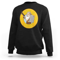 Black crewneck sweatshirt with large round Moses graphic on the chest