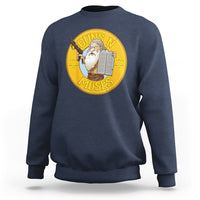 Navy crewneck sweatshirt with large round Moses graphic on the chest