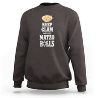 Dark chocolate passover sweatshirt with "Keep Calm and Eat Matzo Balls" graphic