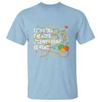 Light blue T-shirt with multicolor "It's fine" graphic print on the front