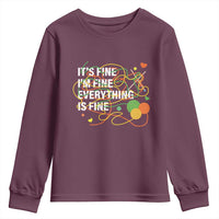 Youth crewneck sweatshirt in maroon, long sleeves, front “It’s fine” graphic
