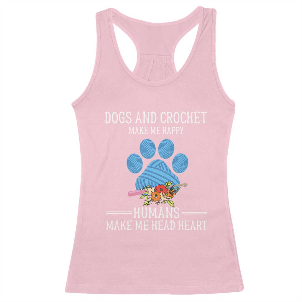 Light pink racerback tank top with dog paw graphic and Make Me Happy text