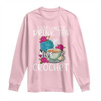 Light pink long-sleeve shirt with front graphic "Drink Tea" and "Crochet"