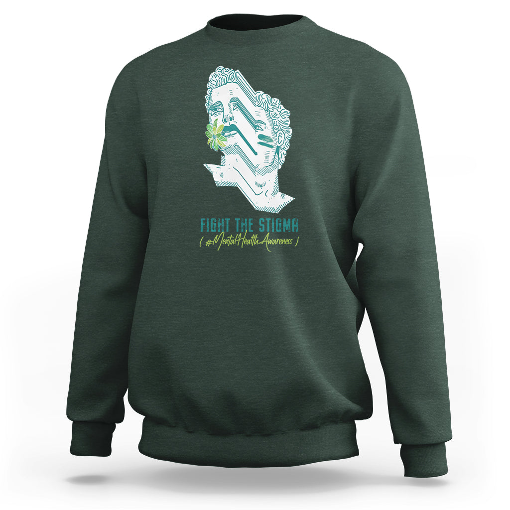 Dark green sweatshirt with front face graphic and 'FIGHT THE STIGMA' print.
