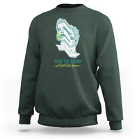 Dark green sweatshirt with front face graphic and 'FIGHT THE STIGMA' print.