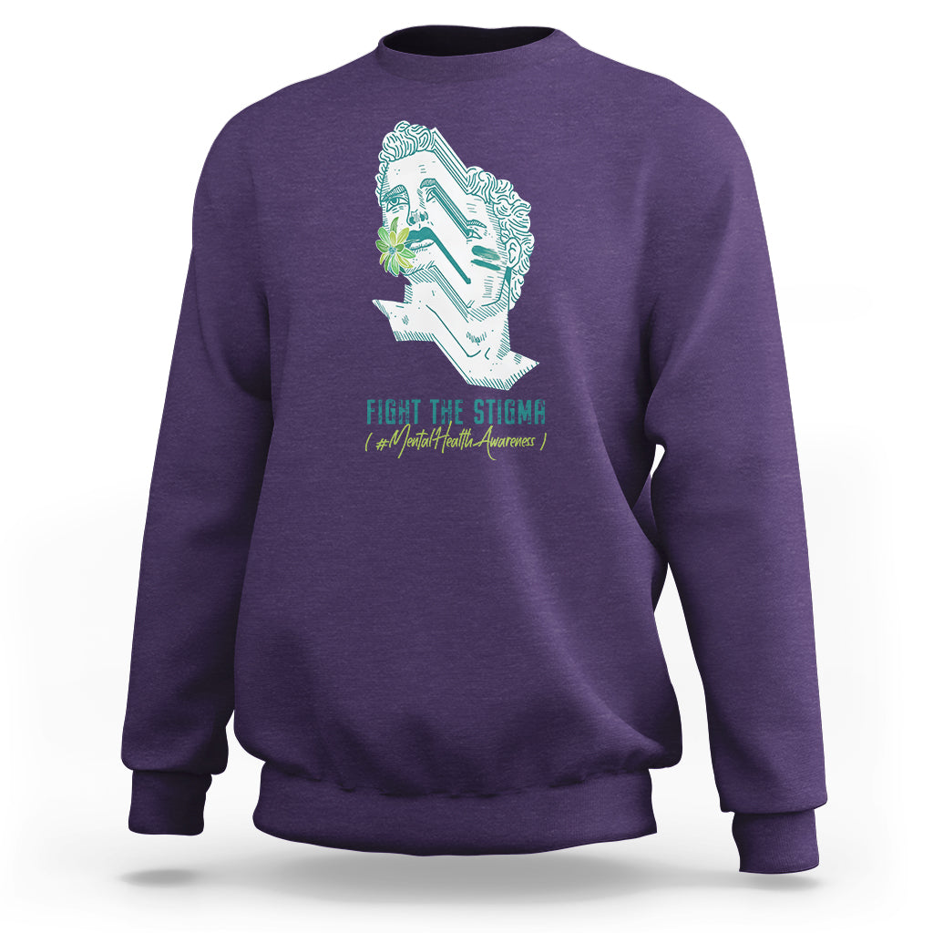 Purple sweatshirt with front face graphic and 'FIGHT THE STIGMA' print.