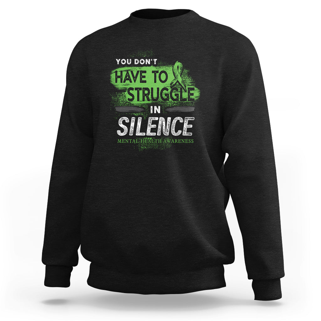 Black mental health sweatshirt with front slogan 'You don't have to struggle in silence' graphic