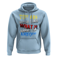 Light blue hoodie with front graphic, drawstring hood, and kangaroo pocket
