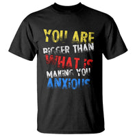 Black T-shirt with bold multicolor motivational text graphic