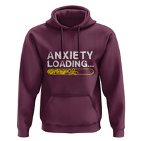 Maroon hoodie with “ANXIETY LOADING...” graphic, pouch pocket, and drawstring hood