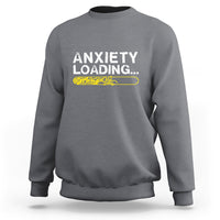 Light gray crewneck sweatshirt with 'ANXIETY LOADING...' graphic on the chest