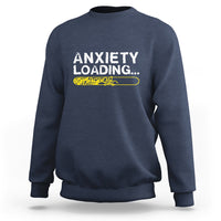 Navy crewneck sweatshirt with 'ANXIETY LOADING...' graphic on the chest
