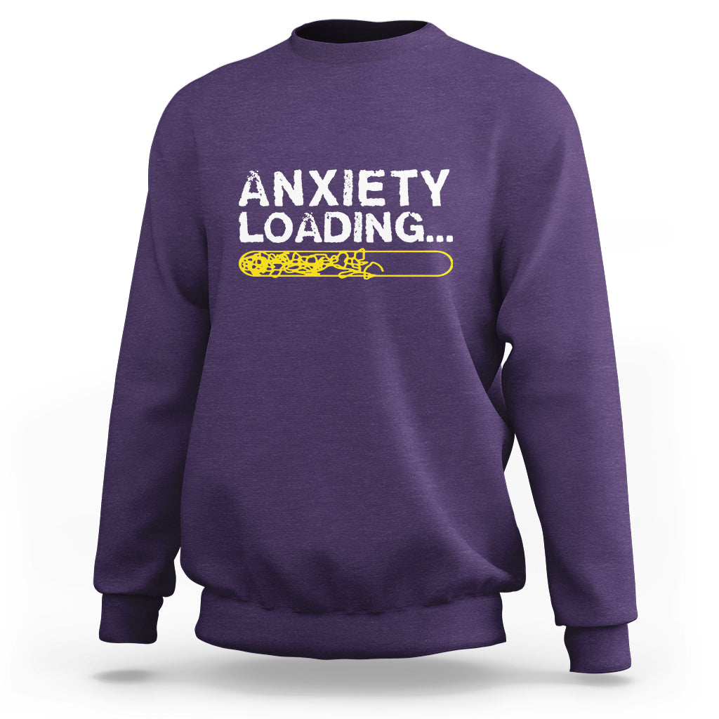 Purple crewneck sweatshirt with 'ANXIETY LOADING...' graphic on the chest