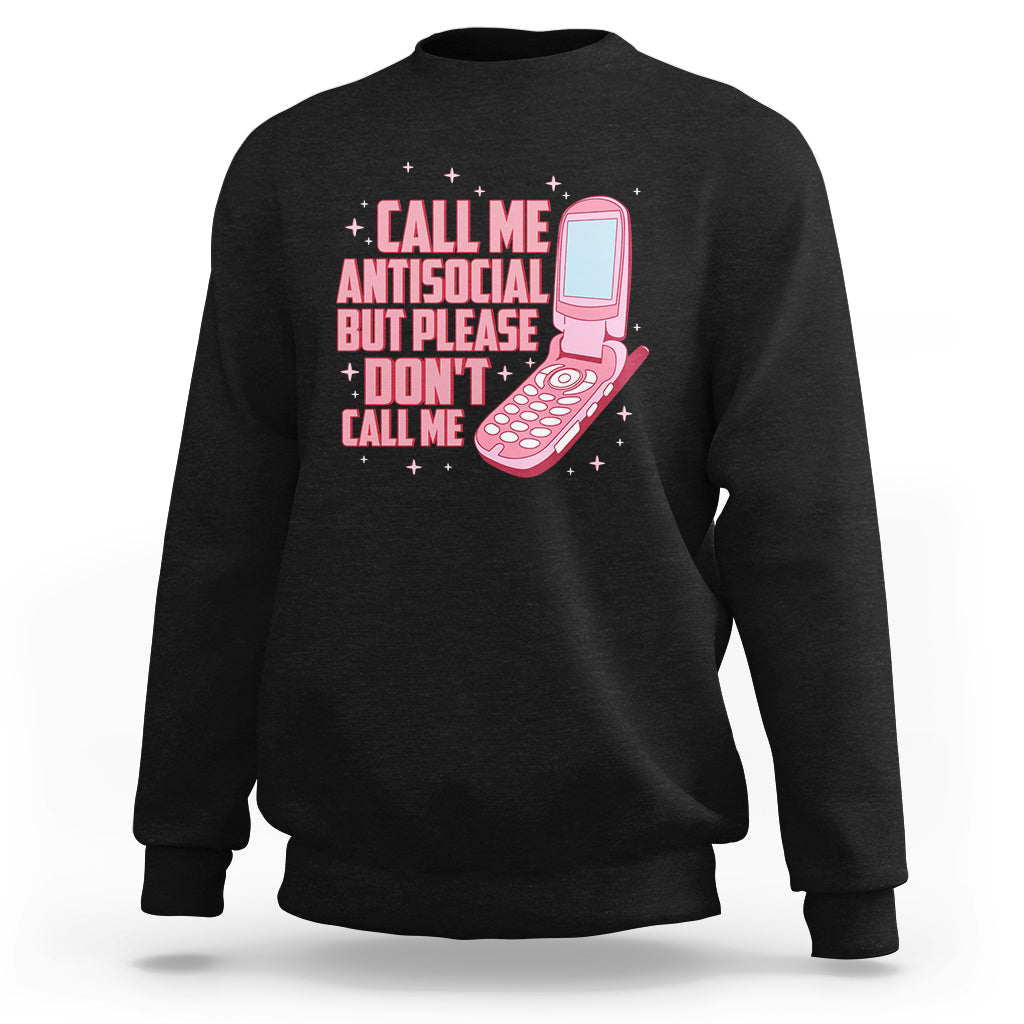 Introvert sweatshirt in black with front graphic text and pink microphone illustration
