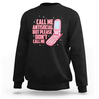 Introvert sweatshirt in black with front graphic text and pink microphone illustration