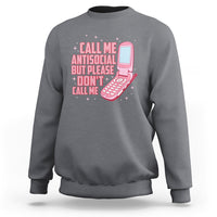 Introvert sweatshirt in charcoal gray with front graphic text and pink microphone illustration
