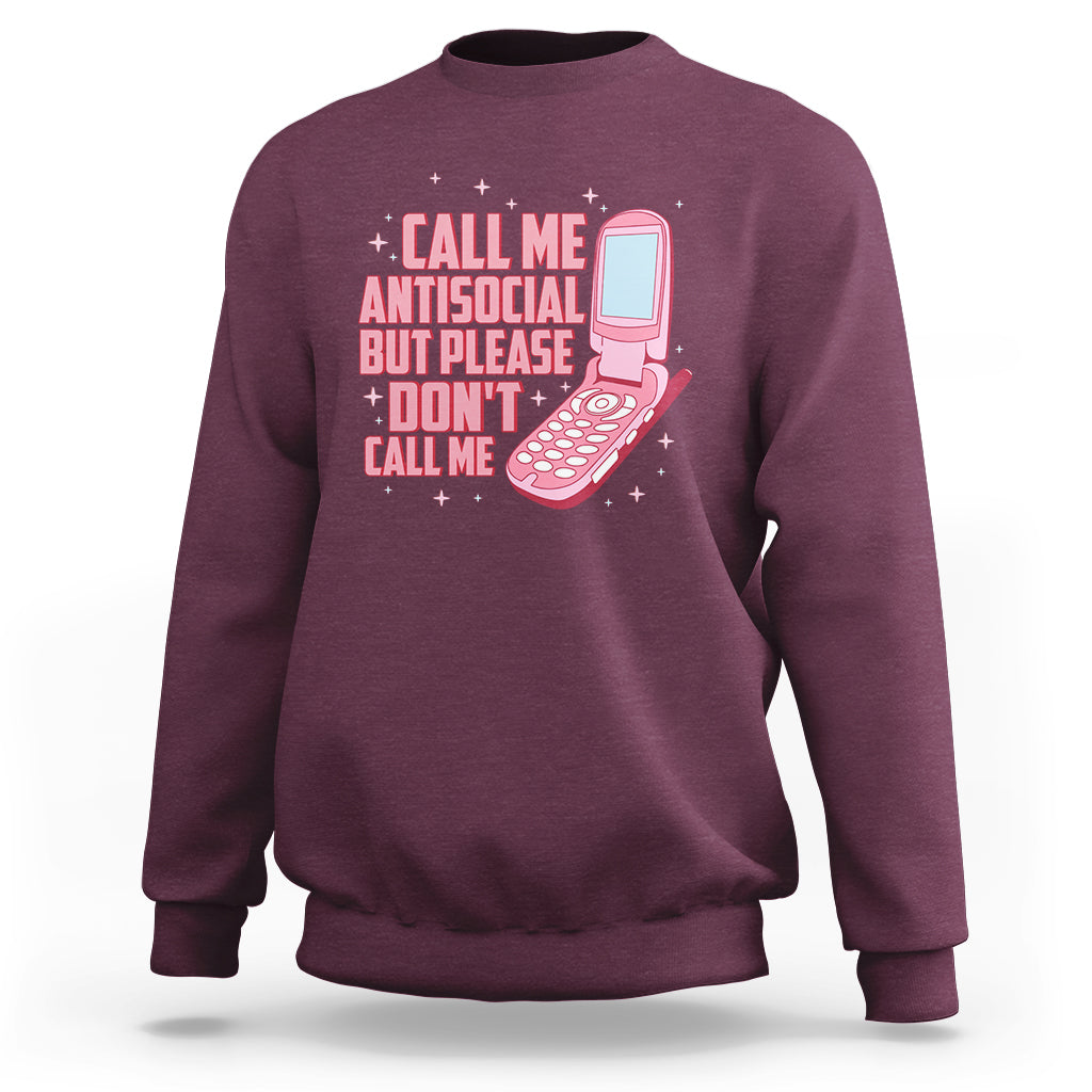 Introvert sweatshirt in maroon with front graphic text and pink microphone illustration