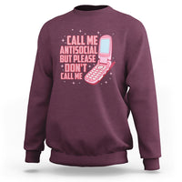 Introvert sweatshirt in maroon with front graphic text and pink microphone illustration