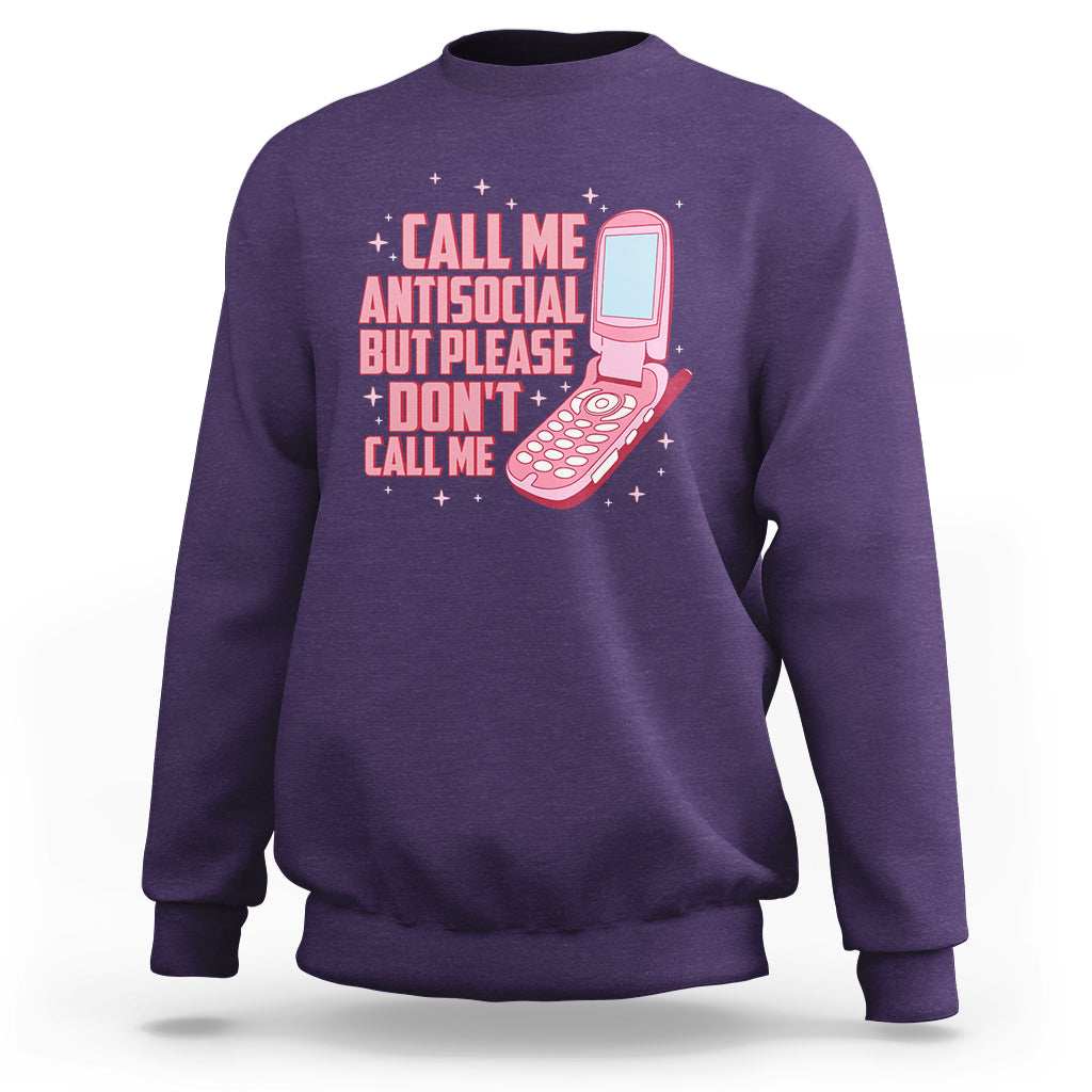 Introvert sweatshirt in purple with front graphic text and pink microphone illustration