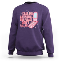 Introvert sweatshirt in purple with front graphic text and pink microphone illustration