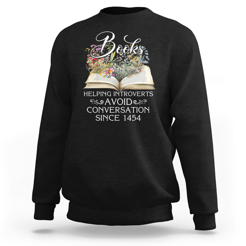 Black crewneck sweatshirt with open-book graphic and 'Avoid Conversation Since 1454'