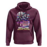 Maroon hoodie with front pocket and colorful book graphic; drawstring hood.