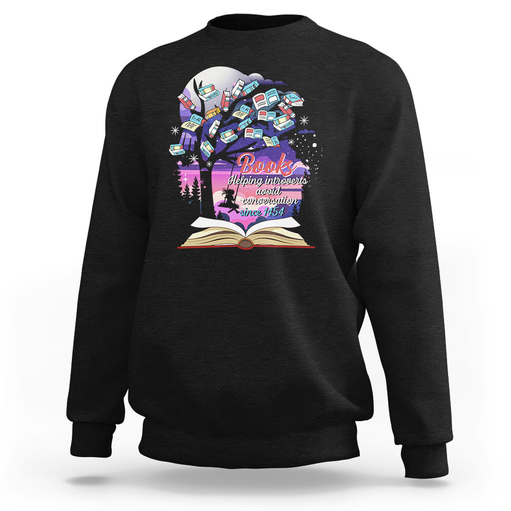 Black crewneck sweatshirt with colorful book graphic and open book print