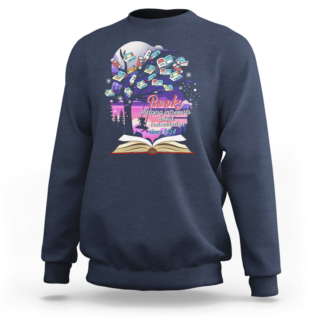 Blue crewneck sweatshirt with colorful book graphic and open book print