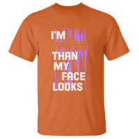Crew neck T-shirt in orange with multicolor "I'm Nicer Than My Face Looks" print