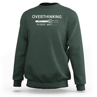 Dark green sweatshirt with 'OVERTHINKING' 'PLEASE WAIT...' graphic on chest, crew neck