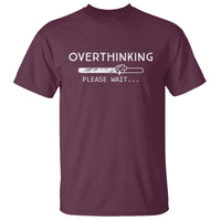 Burgundy graphic T-shirt with white 'OVERTHINKING' and 'PLEASE WAIT...' print