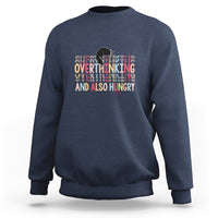 Blue crewneck sweatshirt with cute cat and “Overthinking And Also Hungry” graphic