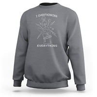 Charcoal gray crewneck sweatshirt with front graphic text: I overthinking EVERYTHING