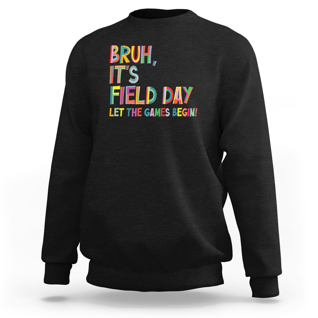 Black crewneck sweatshirt with colorful 'BRUH, IT'S FIELD DAY!' graphic.