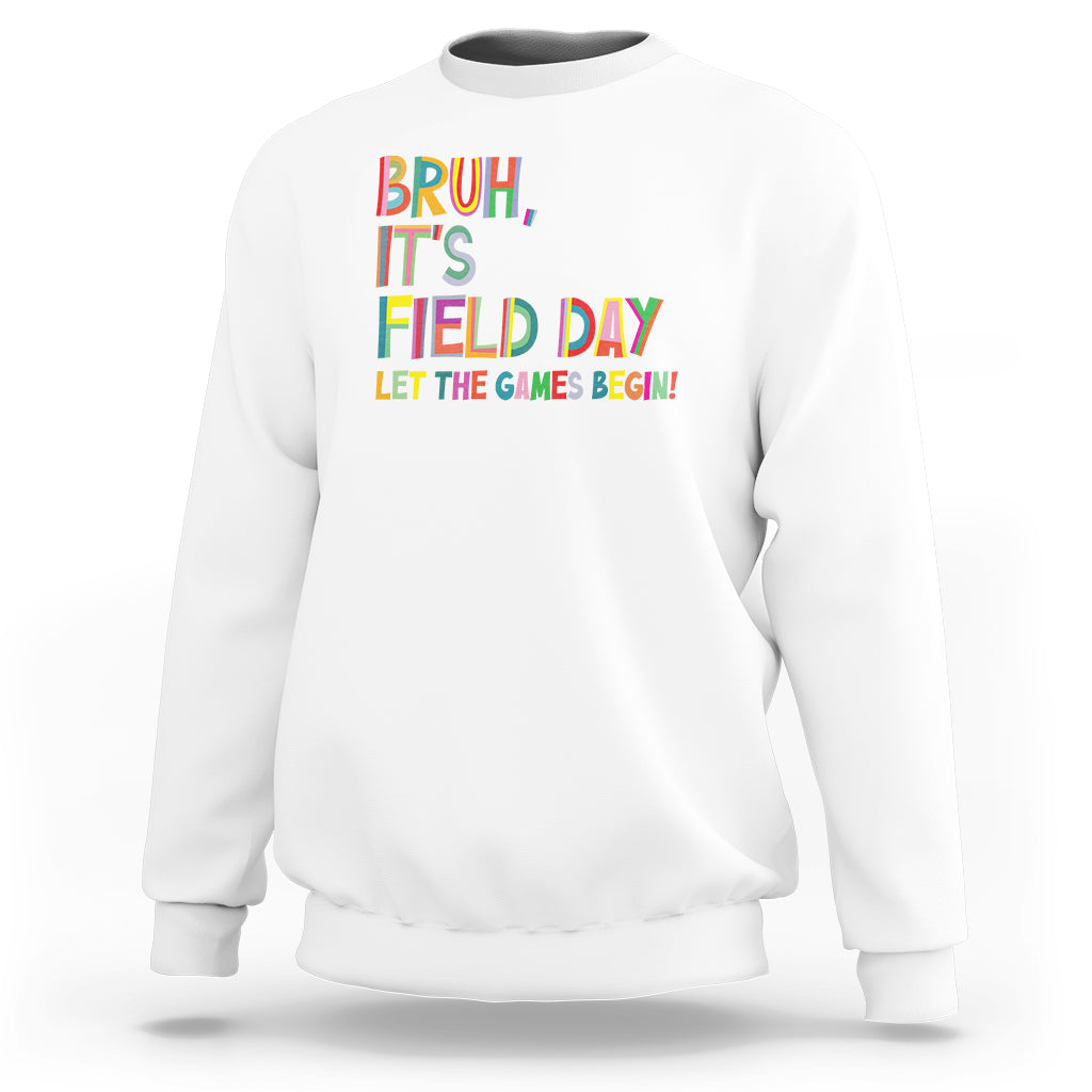White crewneck sweatshirt with colorful 'BRUH, IT'S FIELD DAY!' graphic.