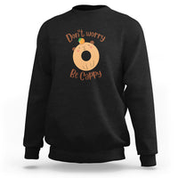 Black capybara lover sweatshirt with “Don’t worry, Be Cappy” graphic on chest