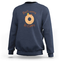 Navy capybara lover sweatshirt with “Don’t worry, Be Cappy” graphic on chest