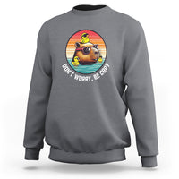 Charcoal capybara lover sweatshirt, capybara graphic with “Don’t Worry, Be Capy”